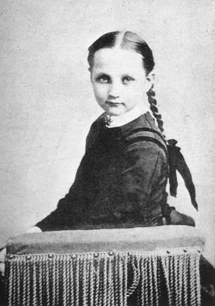 photograph of a young girl with her hair braided