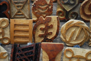 Cluster of adinkra stamps made from carved calabash gourd