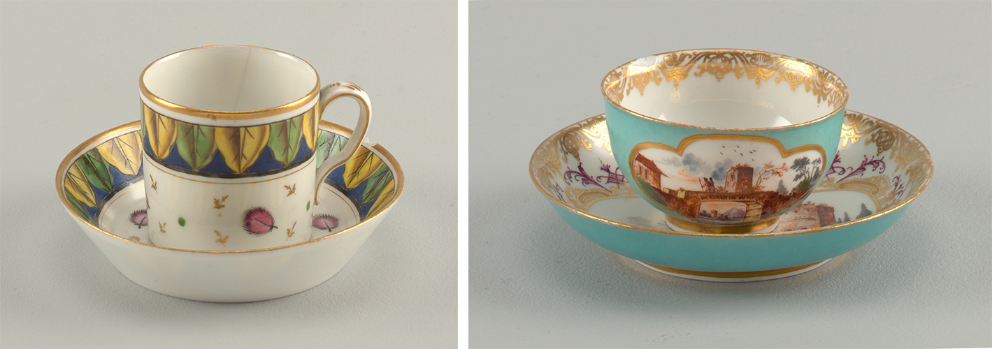 Side-by-side images, each of a teacup and saucer. the one on the left is cylindrical in shape and features decoration of yellow and green leaves against a blue band and pink feathers on a white background. The cup on the right has a more curved form with a teal background with ornate gilding around the rims.