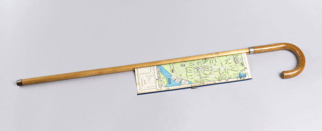 Cane with polished crook handle and short steel tip; extendable map of the city of Boston housed in shaft.