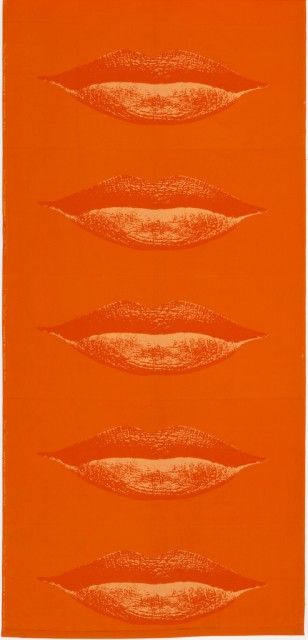 Length of orange cotton printed with large, photo-realist lips, in slightly paler orange.