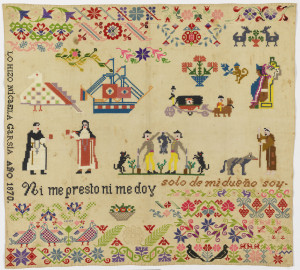 Large square embroidered in bright colors with floral pattern bands, confronted birds, and spot motifs including a monk, a nun, a pair of hunters, a ship, and the seated Aztec prince, Itzcoatl. Text "Ni me presto ni me doy" and "solo de mi dueño soy."
