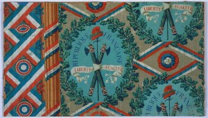Wallpaper designed for the French Revolution, illustrated with oakleaf wreath enclosing crossed fasces, sword & Phrygian cap. Tricolor ribbons wrapped around fluted column bear legend: "Soyons Unis/Nous Serons/Invincibles."
