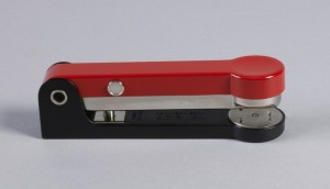 stapler with red top and black bottom