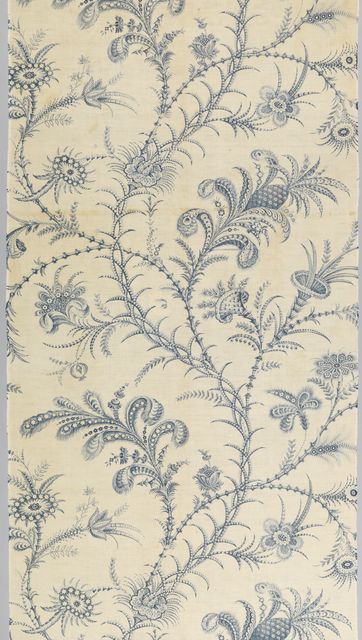 cream textile with blue floral design