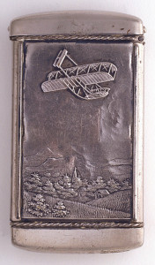 silver matchsafe with wright airplane engraving