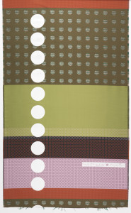 Length of woven fabric with wide horizontal bands of brown, greens, red and pink, some with woven patterns of dots or rings in varied sizes, over-printed with a column of large white dots