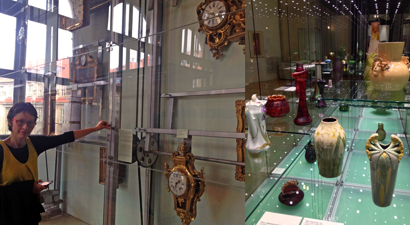 Dyptych with a woman standing beside a gallery of antique guilded clocks, and on the right a room-sized glass case of many ceramic vases, which are white, cream and red. The glass case is dotted with hundreds of reflections of the pin lights from above.