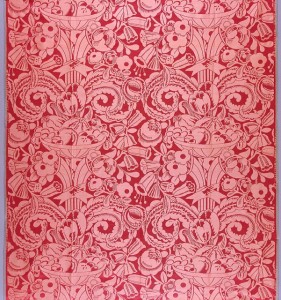red textile with brocade pattern