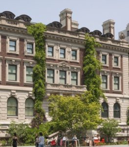 The rear facade of the Carnegie Mansion, home of Cooper Hewitt, with vines of wisteria growing up the side. Click here for information about museum hours and admission.