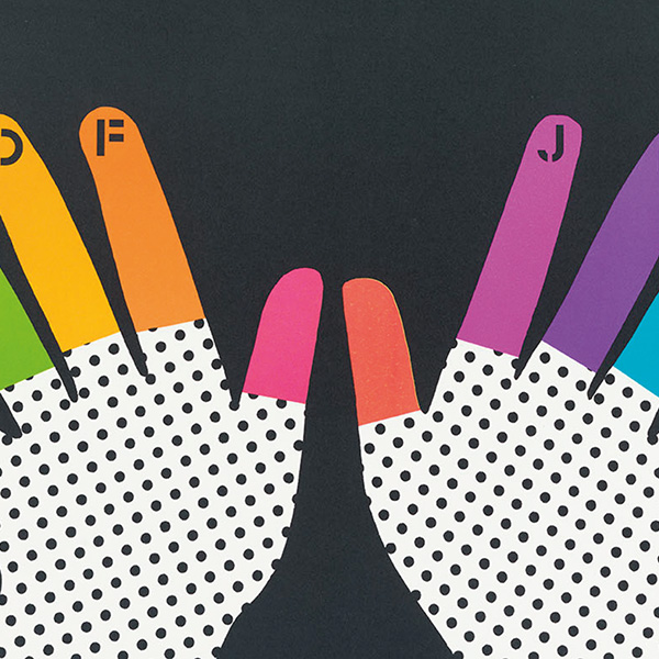 Colorblock cutouts of two hands. The palm has a white and black polka dot pattern and the fingers are each a different color.