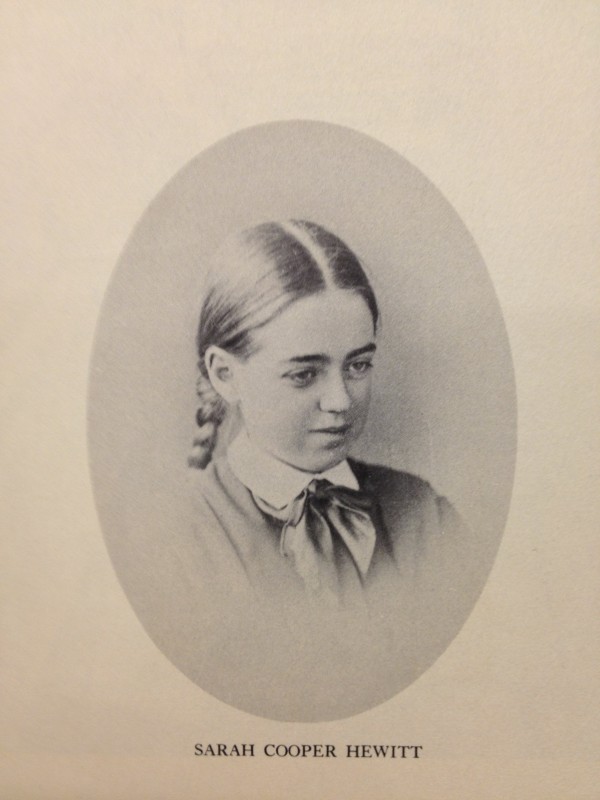 drawing of a young girl with braid and neck bow