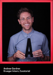 man holding letter A