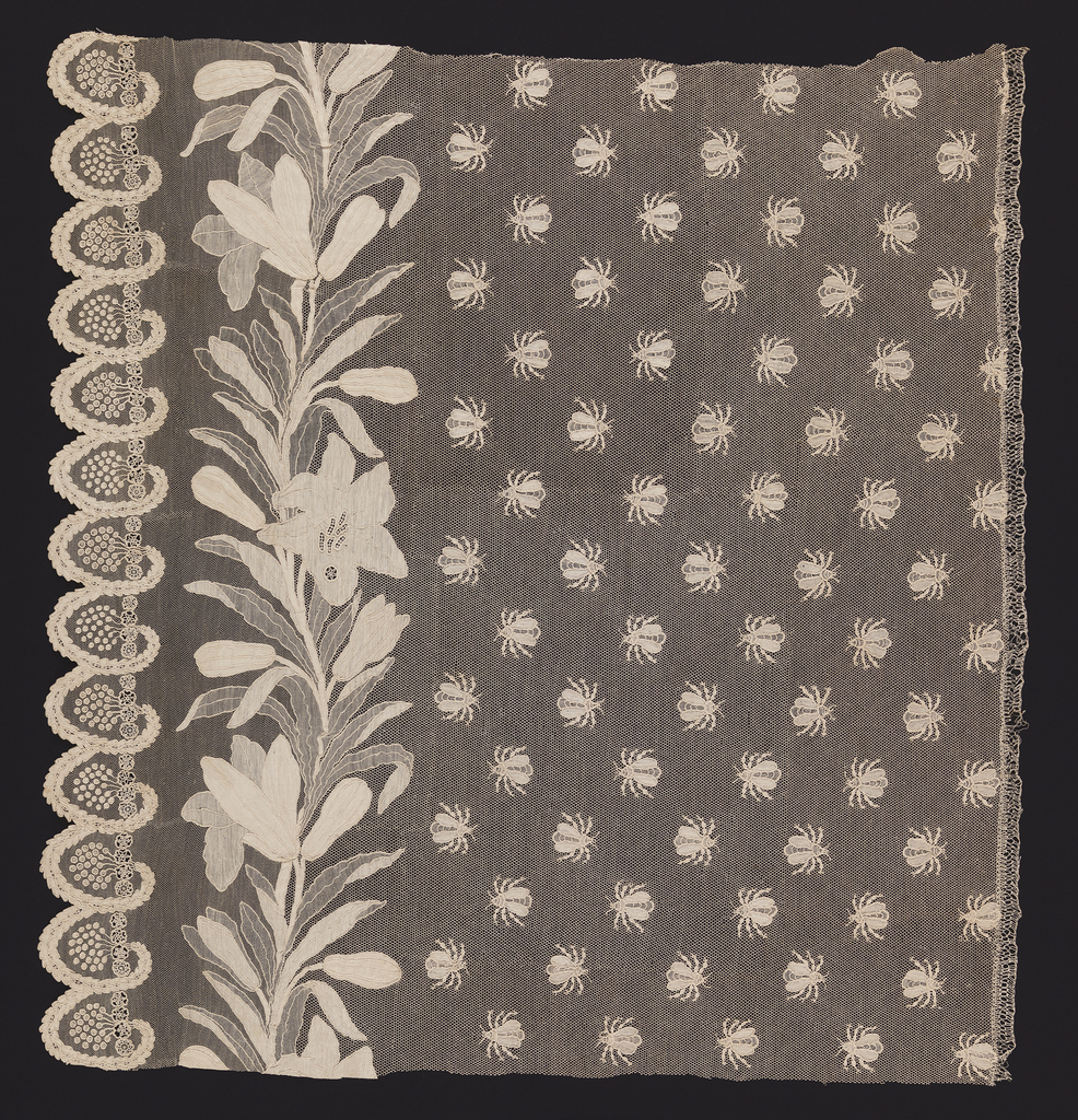 Small piece from a set of bed hangings, with an all-over pattern of bees on a fine net ground. On the left side, a column of lilies and their foliage. A scalloped edge is formed of gracefully curving laurel branches surrounding clusters of berries.