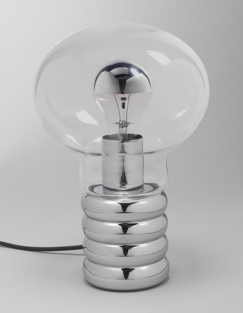Light bulb-shaped clear glass globe enclosing clear glass light bulb with silvered top; cylindrical, chromed metal base in shape of socket with horzontal ridges.