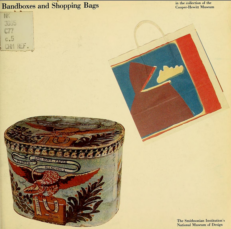 Image of an oval-shaped, painted box beside a colorful paper shopping bag.