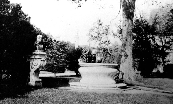 A 15th-century red Verona marble well with Venetian iron was that the Hewitts had installed in their Italian sunken garden.