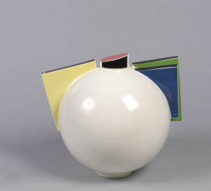 This is a Teapot and lid. It was designed by Marek Cecula. It is dated 1991. Its medium is glazed porcelain.