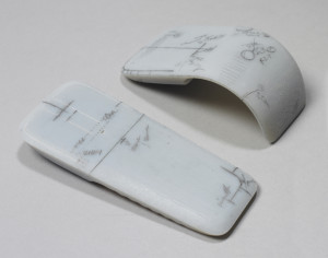 This is a Computer mouse prototype. It was made by Microsoft Hardware User Experience Design Team. It is dated 2010. Its medium is 3d-printed and uv-cured resin, graphite (markings).