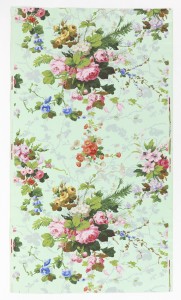 Vining floral pattern. Brightly colored realistically rendered floral bouquets, along with secondary vining pattern in grisaille. Printed on mint green polished or satin ground.