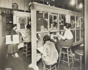 women studying textiles in cases