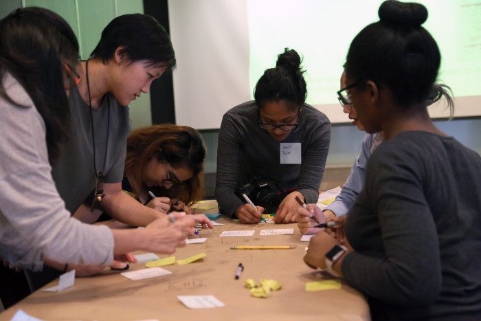 Students working at a table.