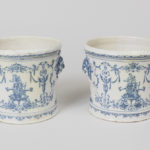 Two faience cache pots produced in Moustiers, France in the 18th century.