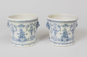 Two faience cache pots produced in Moustiers, France in the 18th century.