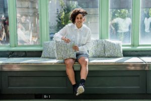 Image of Shantell Martin with her textiles at Cooper Hewitt Museum Conservatory