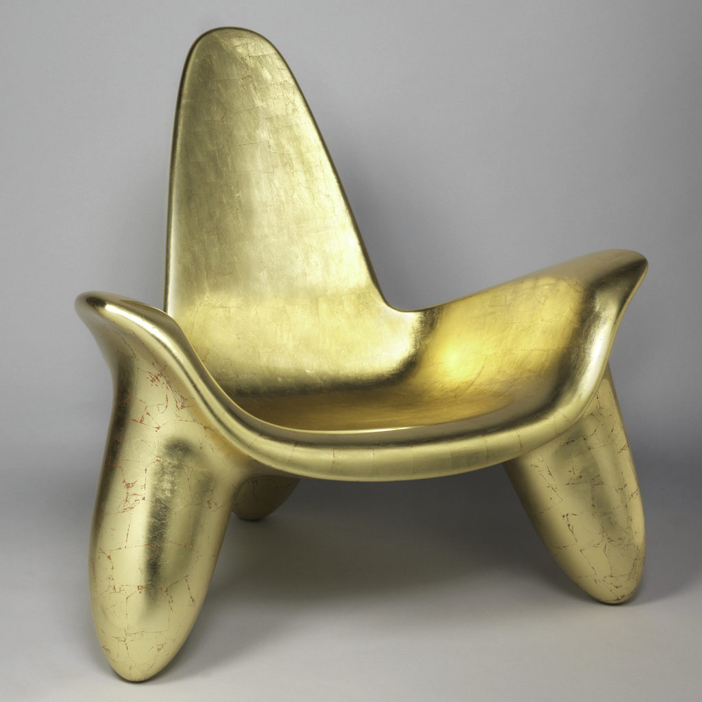 an image of the Triad Chair designed by Wendell Castle.