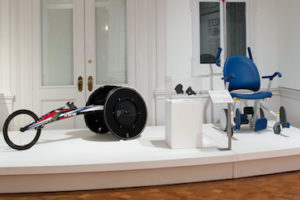 Photograph of wheelchairs on view in Access+Ability used to illustrate information on universal design workshop. Scroll down for more information.