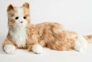 A robot pet cat designed to be a therapeutic device for people with dementia and autism. Image illustrates a Design Kids workshop on design and interaction. Scroll down for more information.