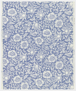 Image shows a floral wallpaper with mallow and other wildflowers printed in blue on an off-white ground. Please scroll down to read the blog post about this object.