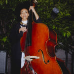 Photo of Esperanza Spalding performing at Cocktails at Cooper Hewitt in 2017.