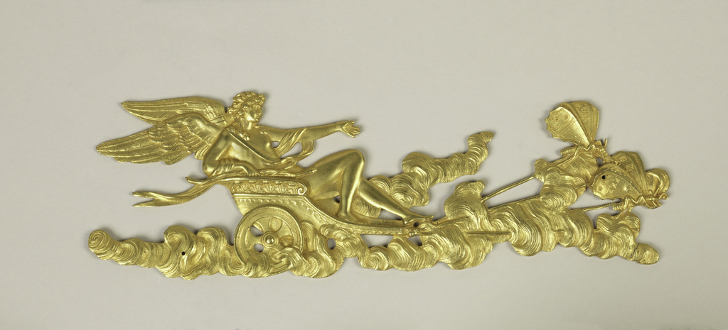 Image features a gilt bronze mount depicting a winged figure in a chariot pulled by butterflies. Please scroll down to read the blog post about this object.