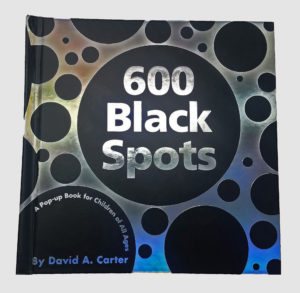 Image features black circles on a silver background with title "600 Black Spots". Please scroll down to read the blog post about this object