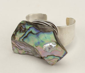 A silver cuff bracelet mounted with a piece of mother-of-pearl shell. N, ca. 1960; Made by Frank Rebajes (American, b. Dominican Republic, 1907 - 1990)
