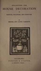 Image features title page of book with art of home ribbon with a potted tree