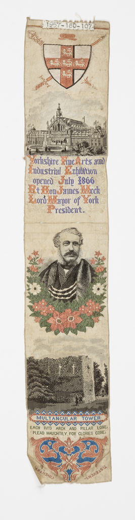Image features a bookmark woven to show commemorative pictures, inscriptions. Top to bottom: a coat of arms of York; large building topped with flags, inscription "Yorkshire Fine Arts and Industrial Exhibition opened July 1866 Rt. Hon. James Meek Lord Mayor of York, President", garlanded portrait of a man, Roman ruins, and the inscription: "MULTANGULAR TOWER Each ivi'd arch and pillar lone, plead haughtily for glories gone." At bottom, heart-shaped motif with floral accents in red and blue. Colors: black, grey, orange, purple, green, on white ground. Please scroll down to read the blog post about this object.