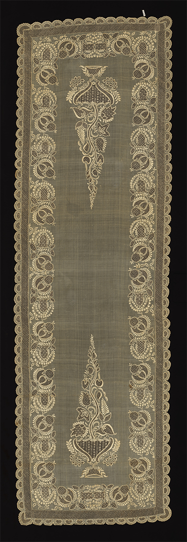 Image features a sheer ivory scarf embroidered with a flowering tree in a bowl at each end. Scroll down to read the blog about this object.