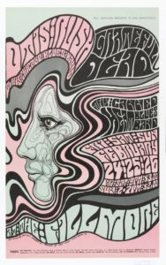 Image features a rock concert poster showing a face in profile, surrounded by pink, black, and grey streams of flowing, wavy hair. Please scroll down to read the blog post about this object.