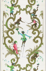 Image features white wallpaper with olive green scrollwork from which fern-like foliage sprouts. Monkeys, dressed in costumes of ultra-bright green, blue, red and pink, are perched on the scrollwork and involved in human activities such playing musical instruments and blowing bubbles. Please scroll down to read the blog post about this object.