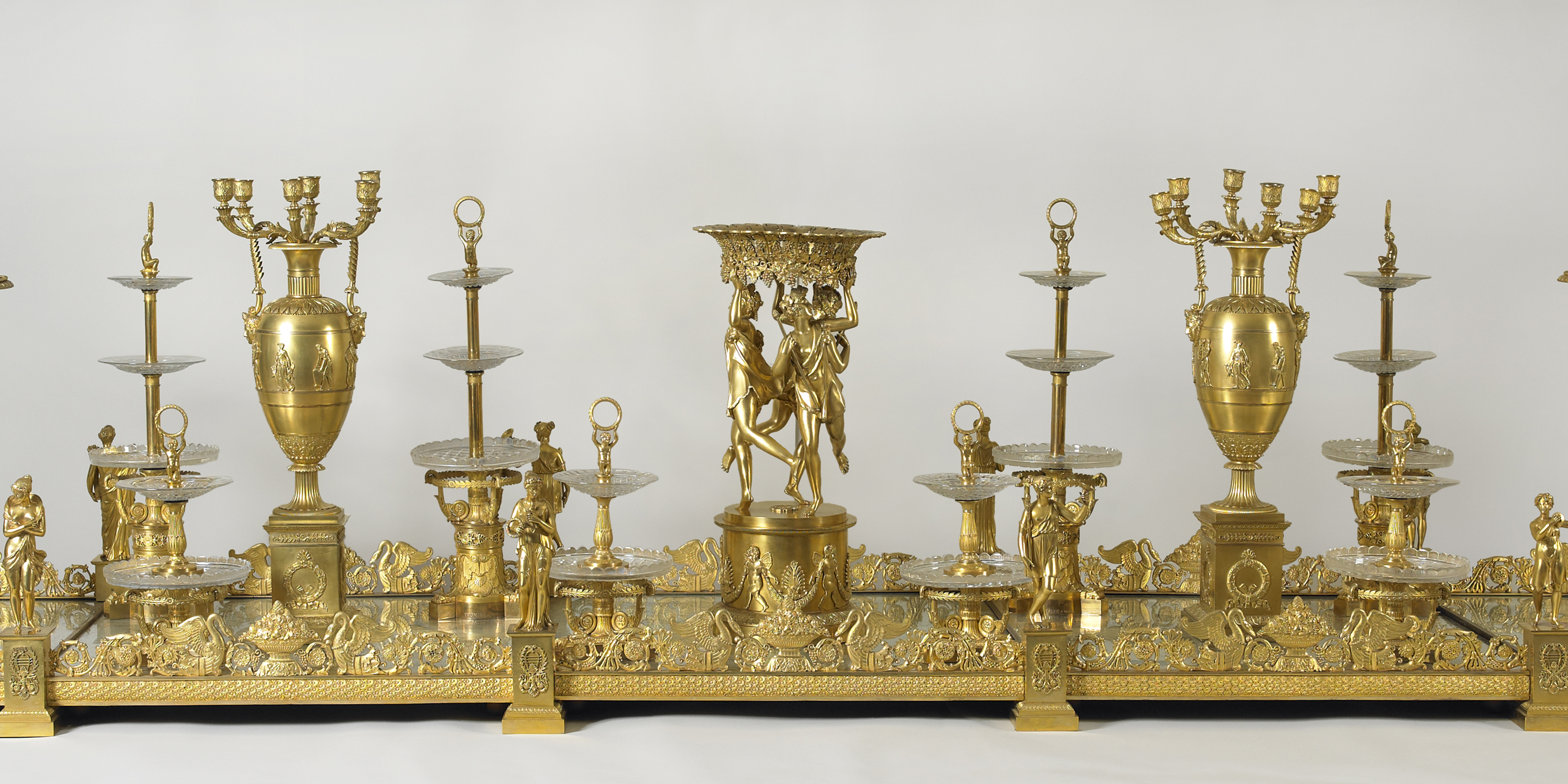 Dining and diplomacy public program. Image of gilded bronze table centerpiece featuring ornate candelabra and mirrored base. Scroll down for additional program information.