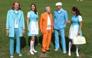 Image of volunteer workers at the Munich Olympic Games in 1972, wearing uniforms designed by Otl Aicher.