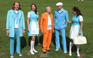 Image of volunteer workers at the Munich Olympic Games in 1972, wearing uniforms designed by Otl Aicher.