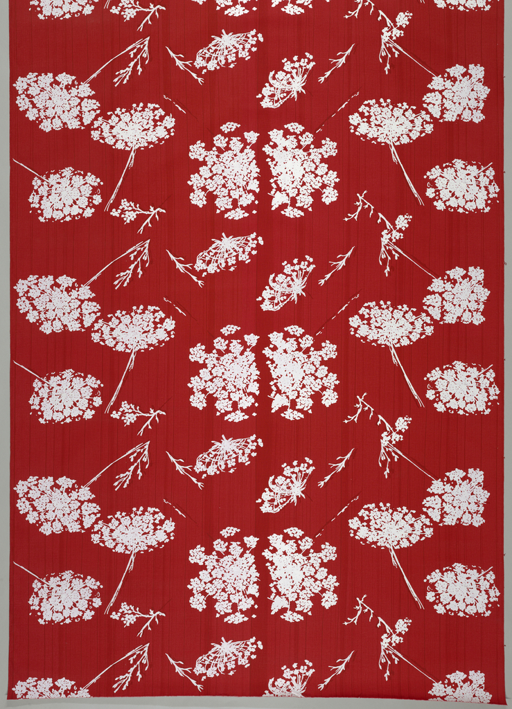Image features a textile with a design of scattered Queen Anne's Lace on a red strié ground. Stems and leaves are screen printed in red to give shadow effect, and flowers are screen printed in white. Please scroll down to read the blog post about this object.