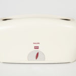 A white toaster designed with an elongated rectangular shape, curved lines, a smooth surface, and a deep red lever.