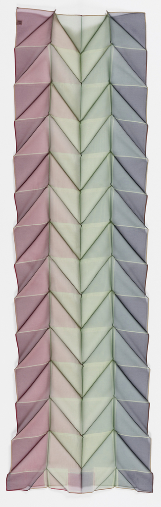 Image features: Crisp pleats in a series of alternating diagonals form a chevron pattern in this sheer scarf of mauve, pale green and pale blue. Please scroll down to read the blog post about this object.