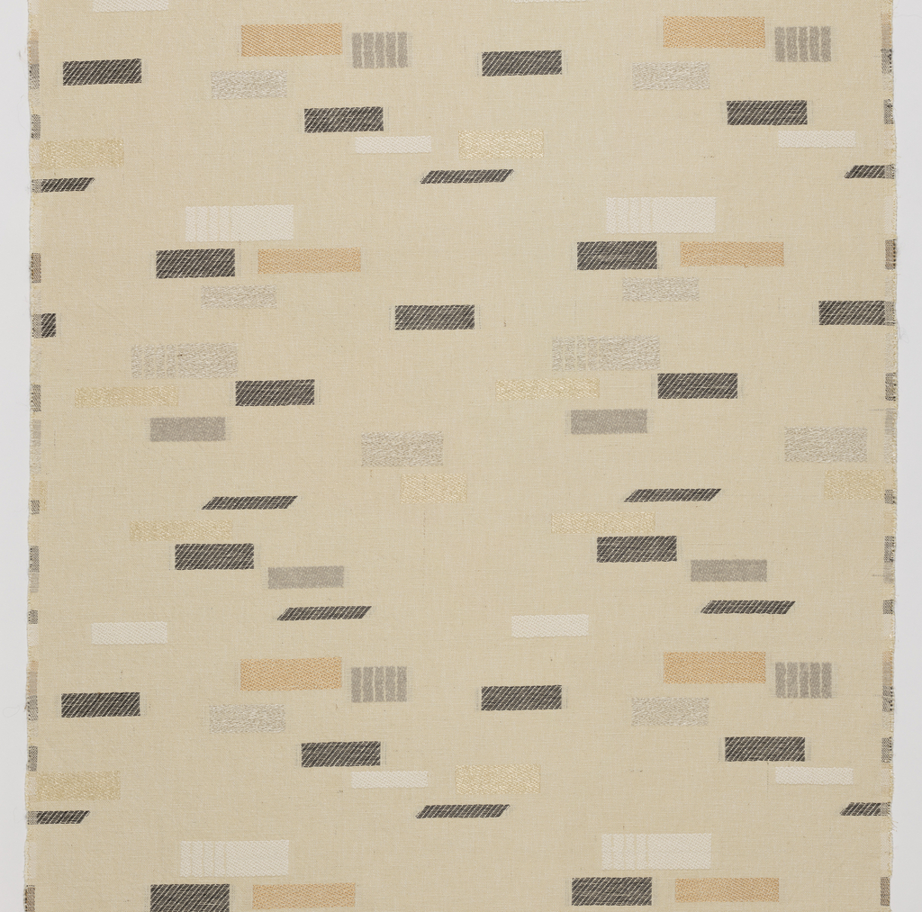 Image features a length of woven textile with an off-white ground and irregular squares and rectangles in different twill weaves and different fibers, in ivory, copper, gray, and dark brown. Please scroll down to read the blog post about this object.