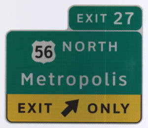 Highway sign reads Exit 27, 56 North, Metropolis, Exit Only